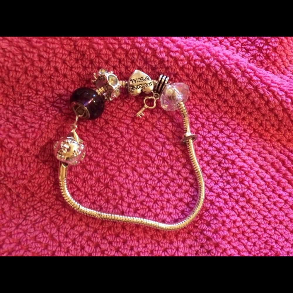 Sterling silver bracelet with beads and accents.